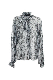 Blusa semi trasparente con fiocco ODI ET AMO
